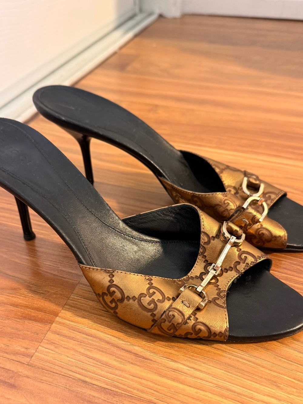 Gucci metallic gold monogram mule heels